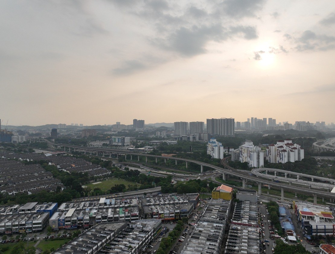 Brightwood Sungai Besi — Real drone photo taken from the actual site, west-facing (Bukit Jalil view, sunset), artist's impression